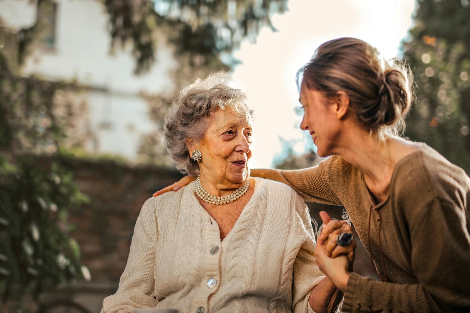 Senior receiving care from a nurse